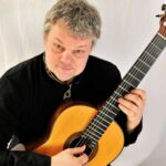 Roger Tristão Adão, guitar