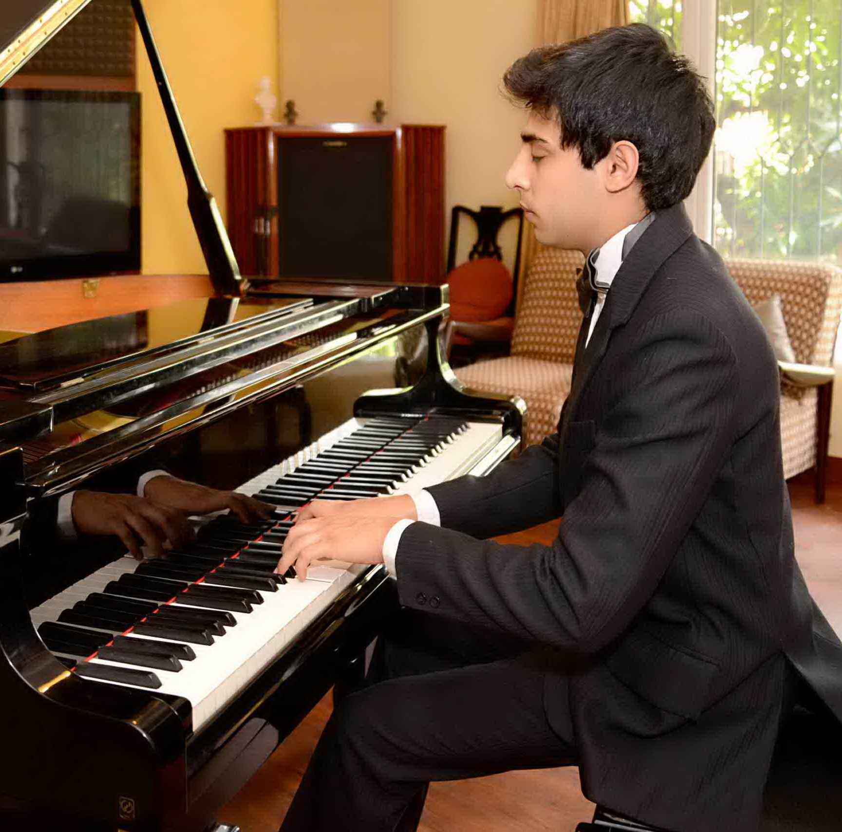 Neville Bharucha, piano