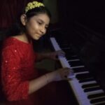 Rose Dam Roy, pianist with Dr. Anjan Ray, narrator